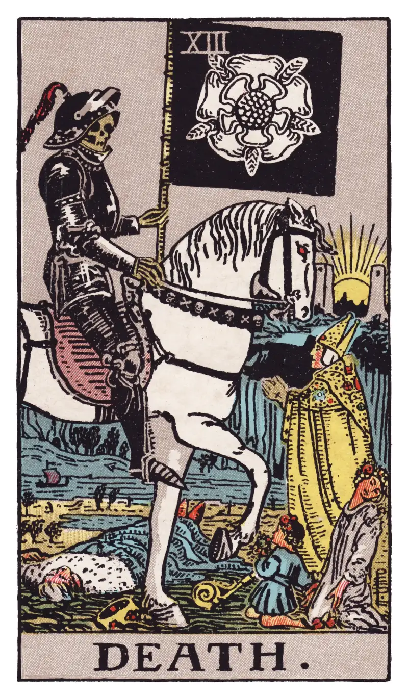 Death tarot card — skeleton in black armor on white horse carrying a banner with a white rose, Rider-Waite-Smith deck