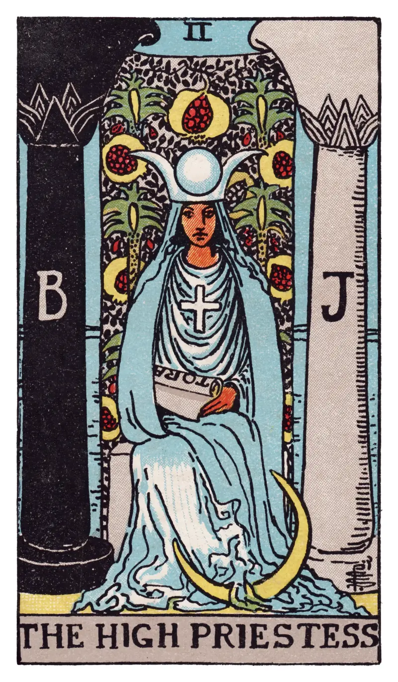 The High Priestess tarot card — seated figure between two pillars with crescent moon and pomegranate veil, Rider-Waite-Smith deck