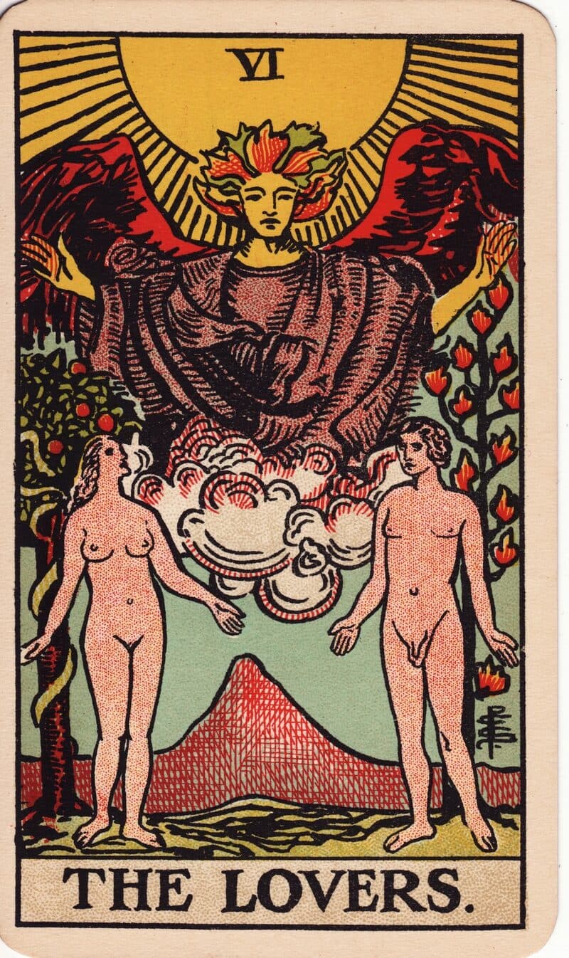 The Lovers tarot card — man and woman beneath a winged angel in a garden with two trees, Rider-Waite-Smith deck